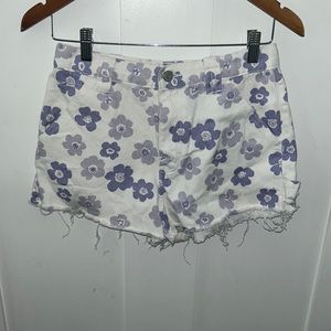 (Actually 27 waist) hi rise white with purple flower jean shorts worn once